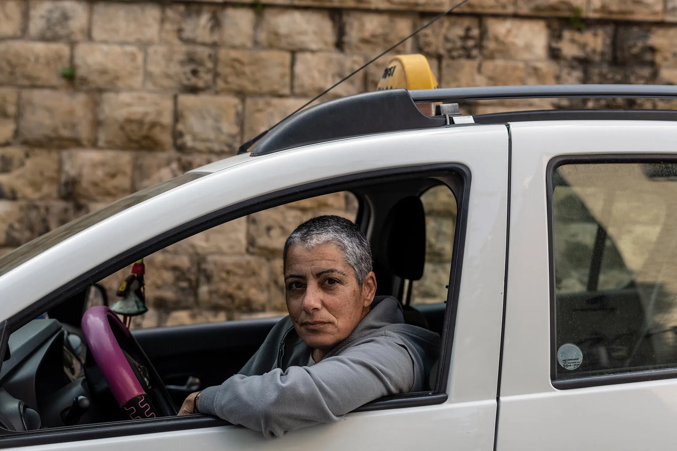 Mizrahi in her taxi.