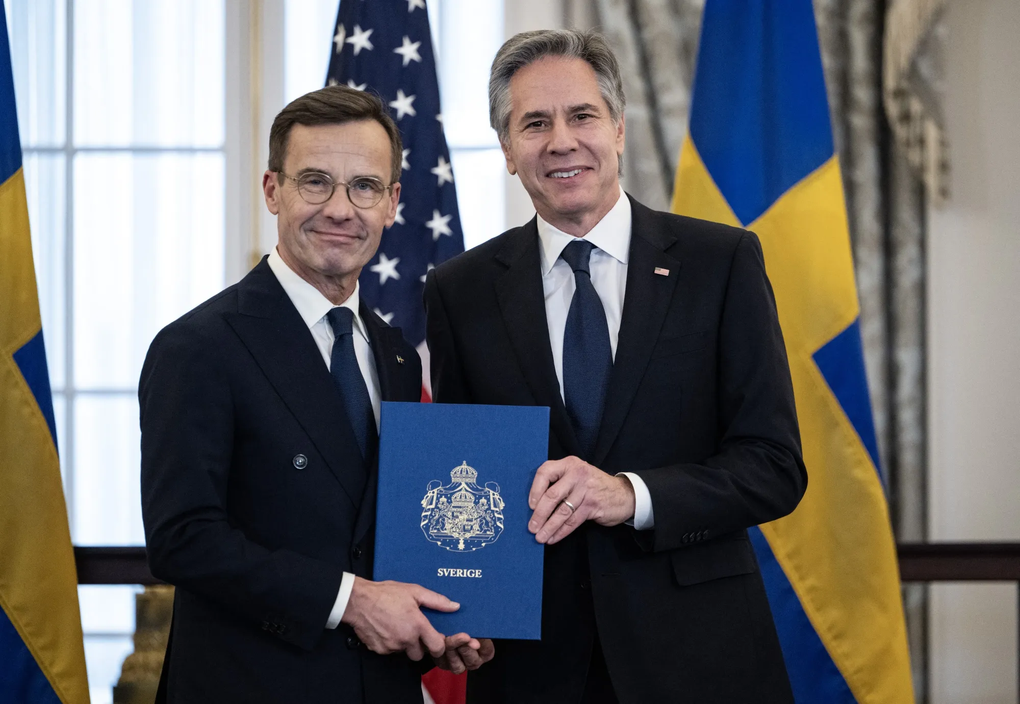 Antony Blinken receives the NATO ratification documents from Ulf Kristersson during a ceremony at the US State Department in Washington, DC on March 7.