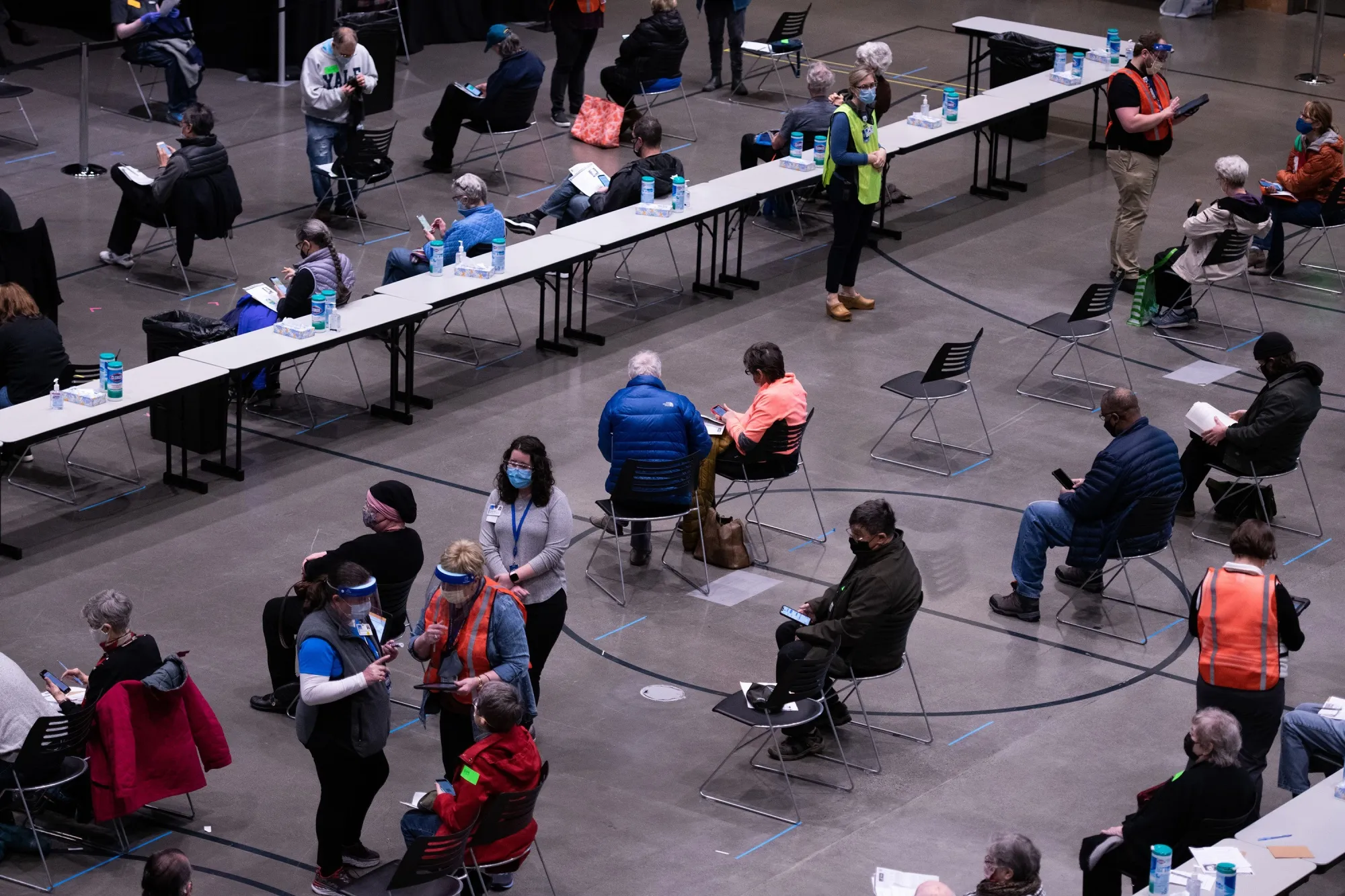 Patients wait&nbsp;following their first dose of the Covid-19 vaccine in Seattle, on Jan. 24.