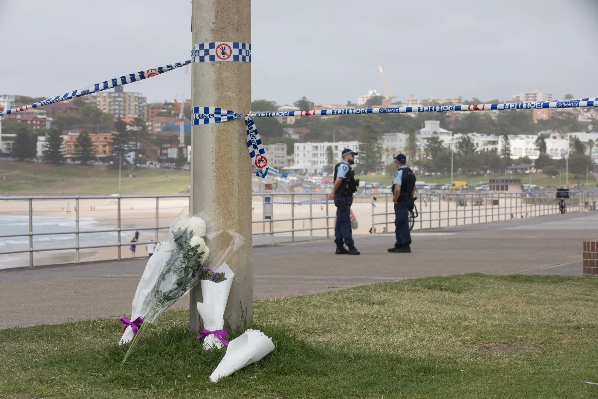 Flowers laid near the scene of the mass shooting at Bondi Beach in Sydney.