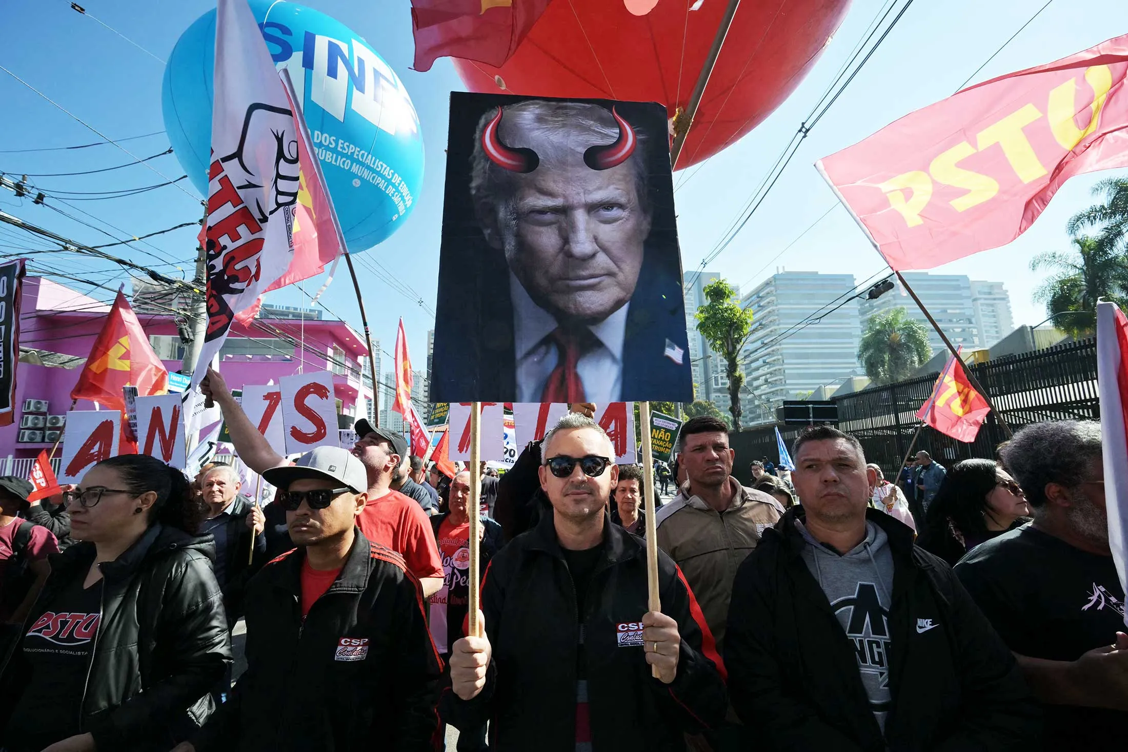 Activists in São Paulo demonstrate on Friday in support of national sovereignty in the face of threats from&nbsp;US President Donald Trump.