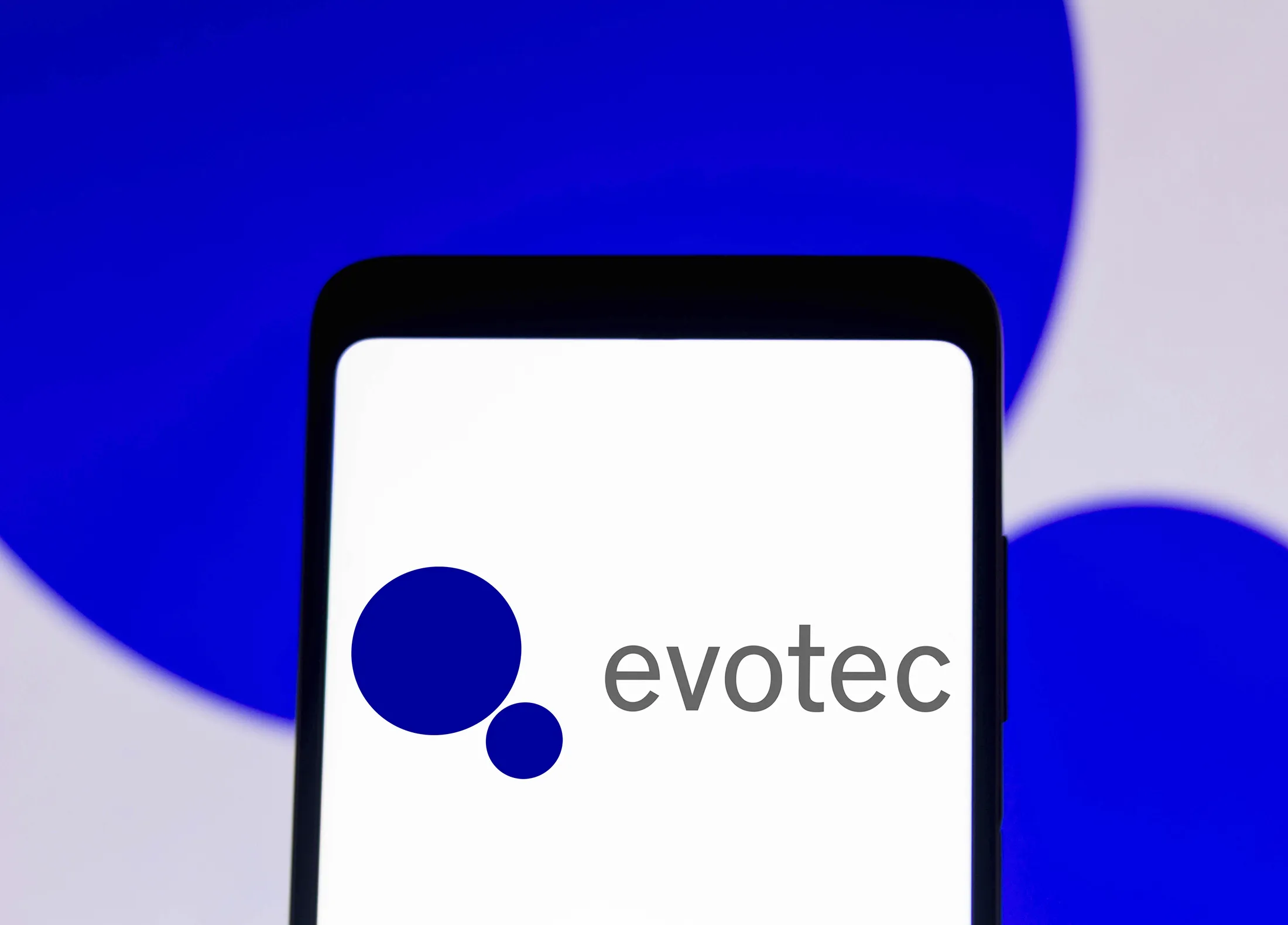 The Evotec SE logo&nbsp;on a smartphone.