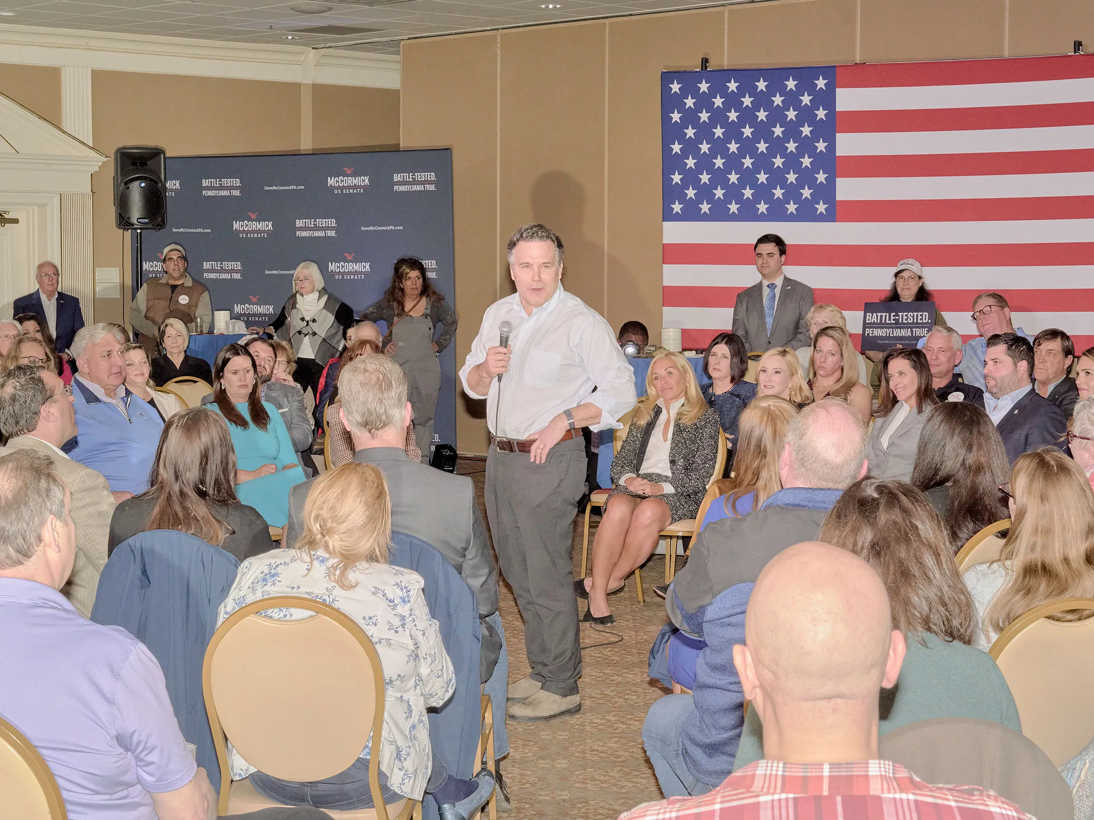 McCormick at a rally in Pittsburgh with Sarah Huckabee Sanders on March 30.&nbsp;