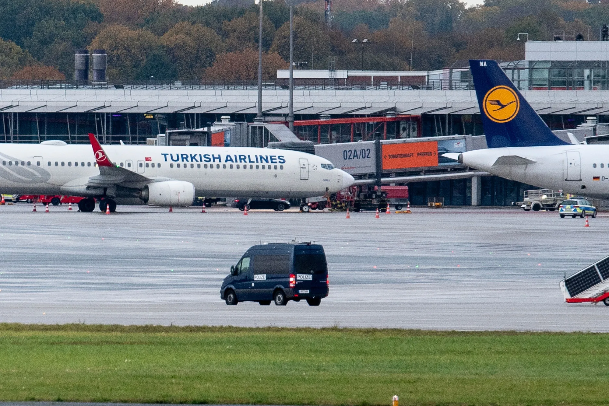 Police monitor a vehicle near a Turkish Airlines aircraft at Hamburg airport on Nov. 5.