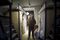 Tyler Xiong wears a teddy bear suit at his apartment, which he shares with 3 other employees of his start up company, at You+