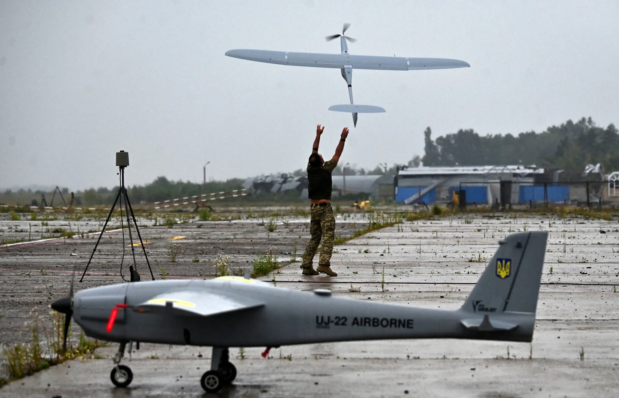 A military operator launches a FlyEye WB Electronics, a Polish reconnaissance drone, during test flights in the Kyiv region of Ukraine&nbsp;in 2022.