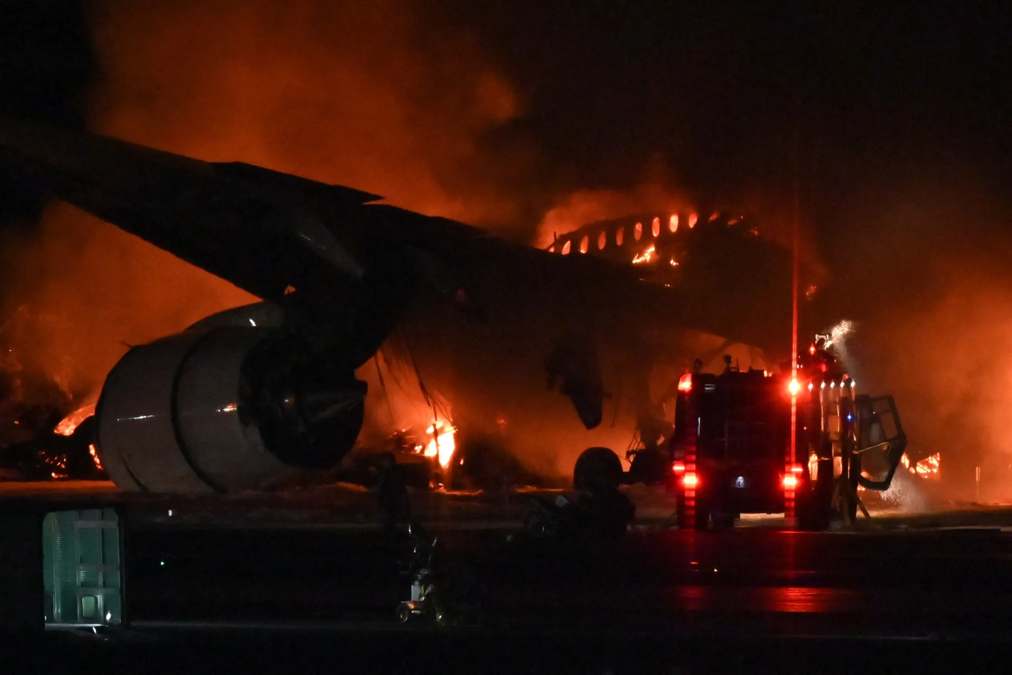 A Japan Airlines passenger plane on fire on a runway of Tokyo's Haneda Airport on Jan. 2.