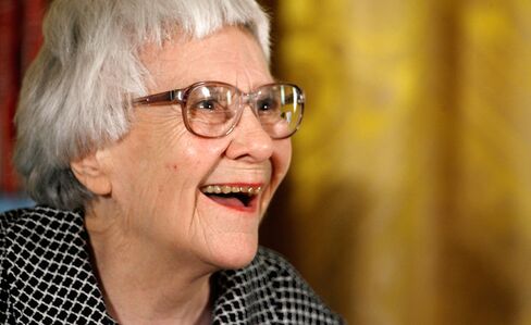 Harper Lee smiles before receiving the 2007 Presidential Medal of Freedom, on Nov. 5, 2007.