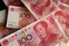 Chinese one-hundred yuan banknotes are arranged for a photograph in Tokyo, Japan, on Tuesday, Aug. 11, 2015. China devalued the yuan by the most in two decades, a move that rippled through global markets as policy makers stepped up efforts to support exporters and boost the role of market pricing in Asia's largest economy.