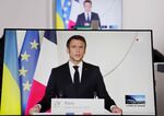 Emmanuel Macron delivers an address on Ukraine, in Paris, on Feb. 24.