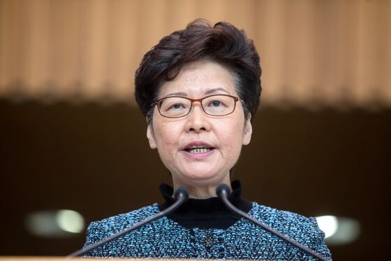 Hong Kong’s Lam Dismisses ‘Malicious’ Report She’ll Be Replaced
