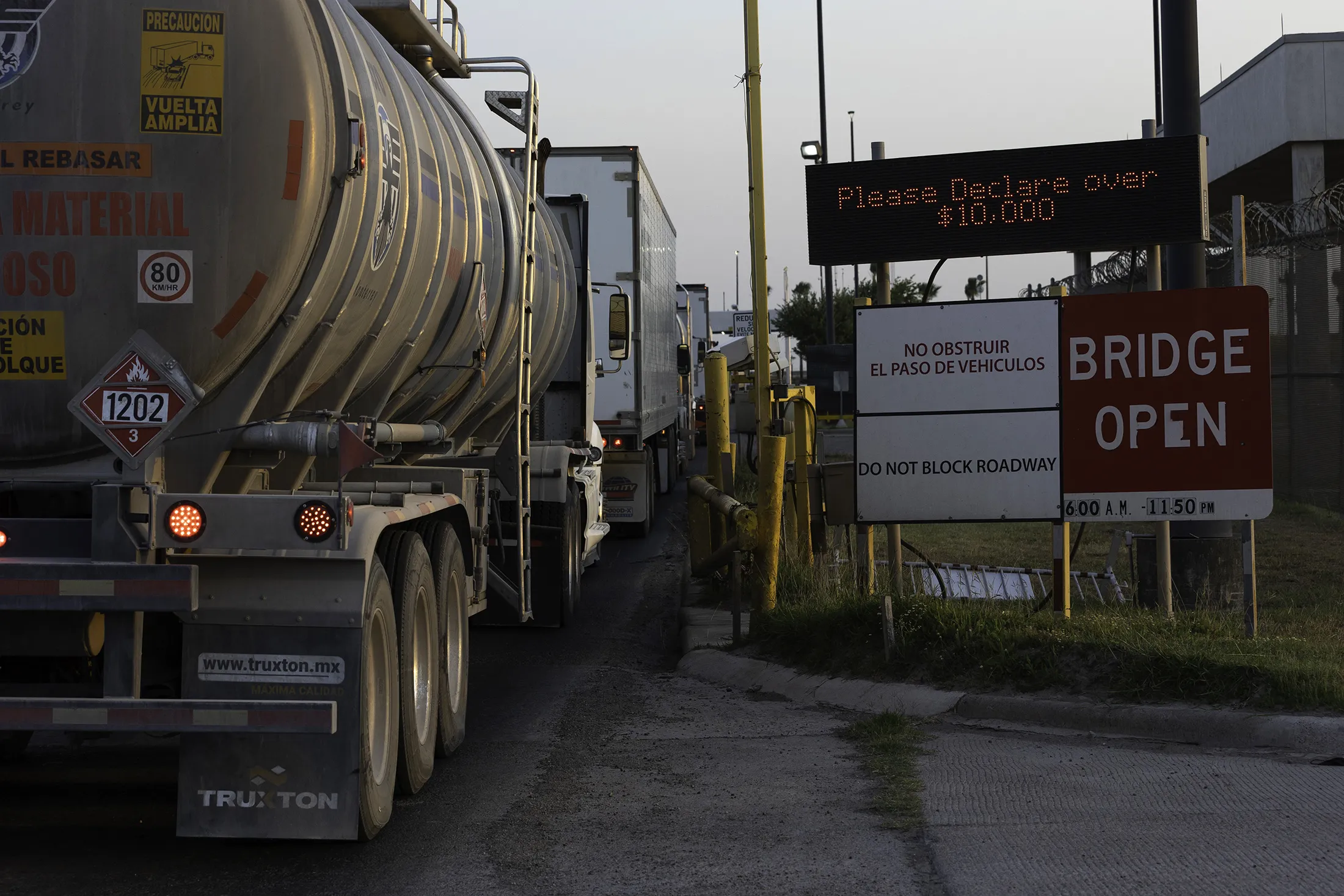 Commercial trucks wait to cross the Pharr-Reynosa International bridge in Pharr, Texas, on April 13.
