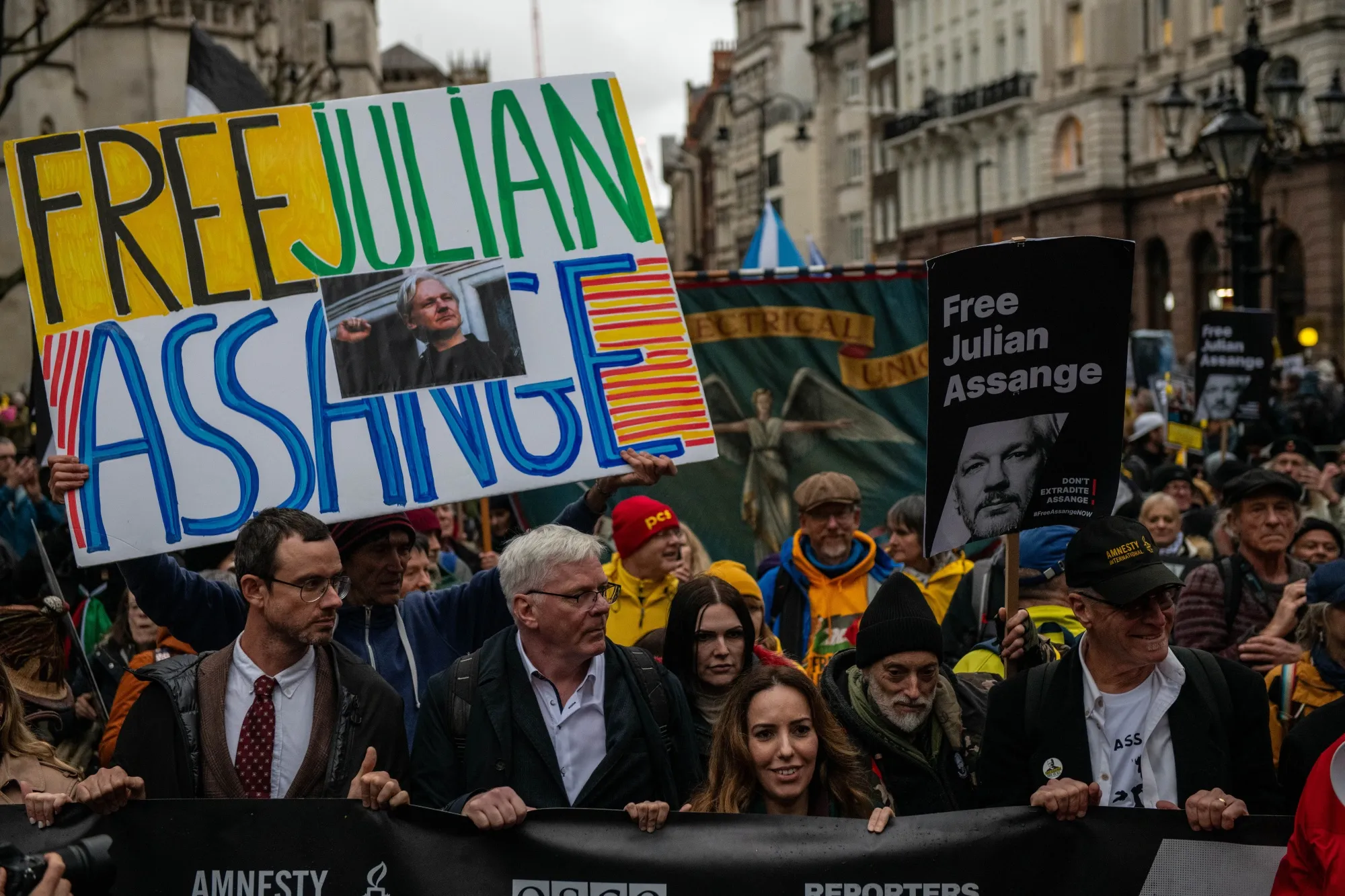 Supporters of Wikileaks founder Julian Assange march in London in February.