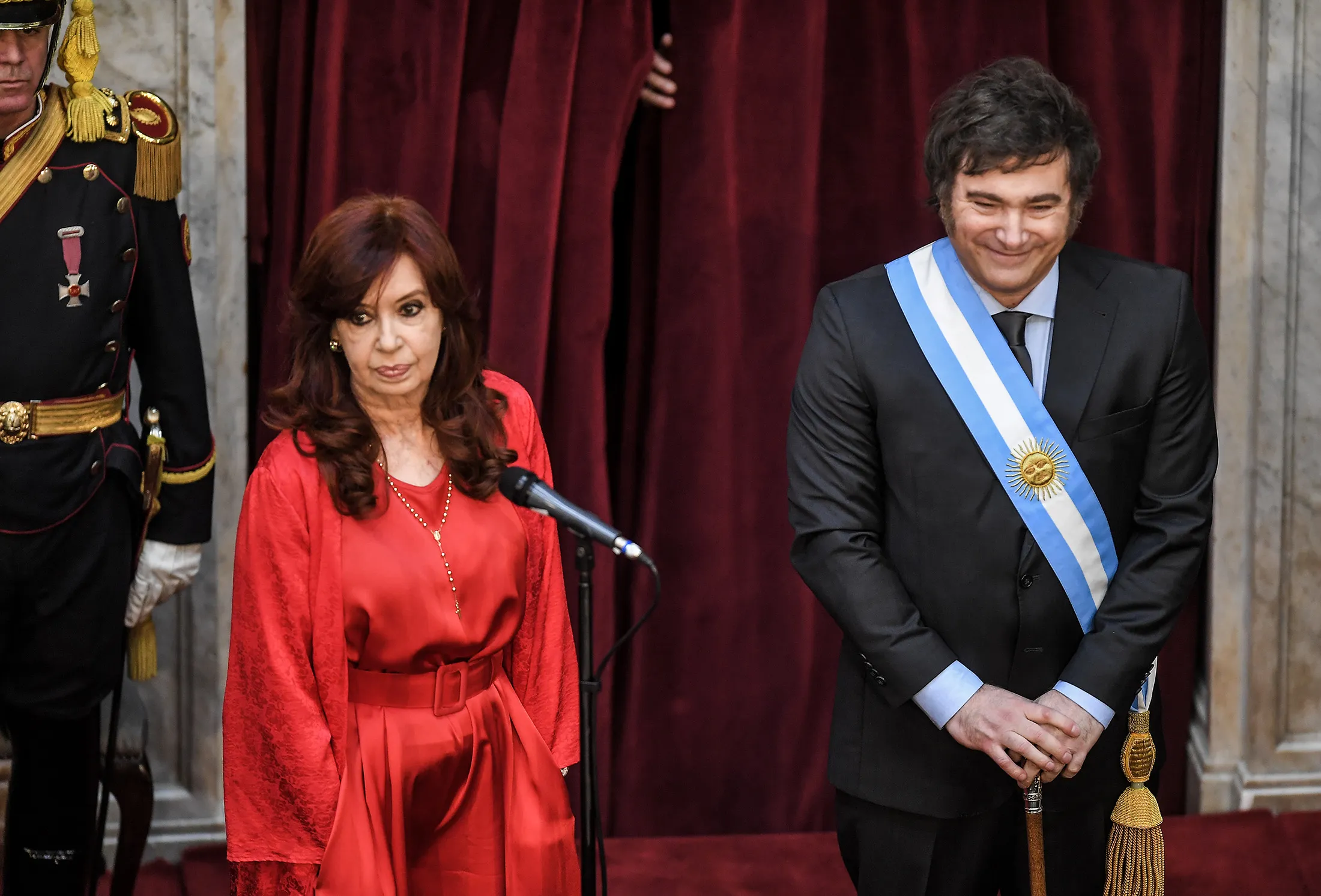 Cristina Fernandez de Kirchner stands alongside Javier Milei during his inauguration.