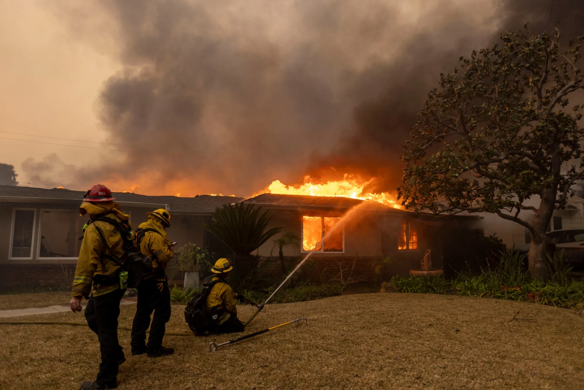 Firefighters battle the Eaton Fire in Altadena, California, on Jan. 8.