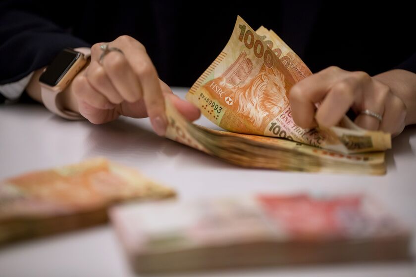 Counting of Hong Kong Dollars At A Hang Seng Bank Branch