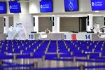 Passport control counters at Dubai's International Airport.&nbsp;