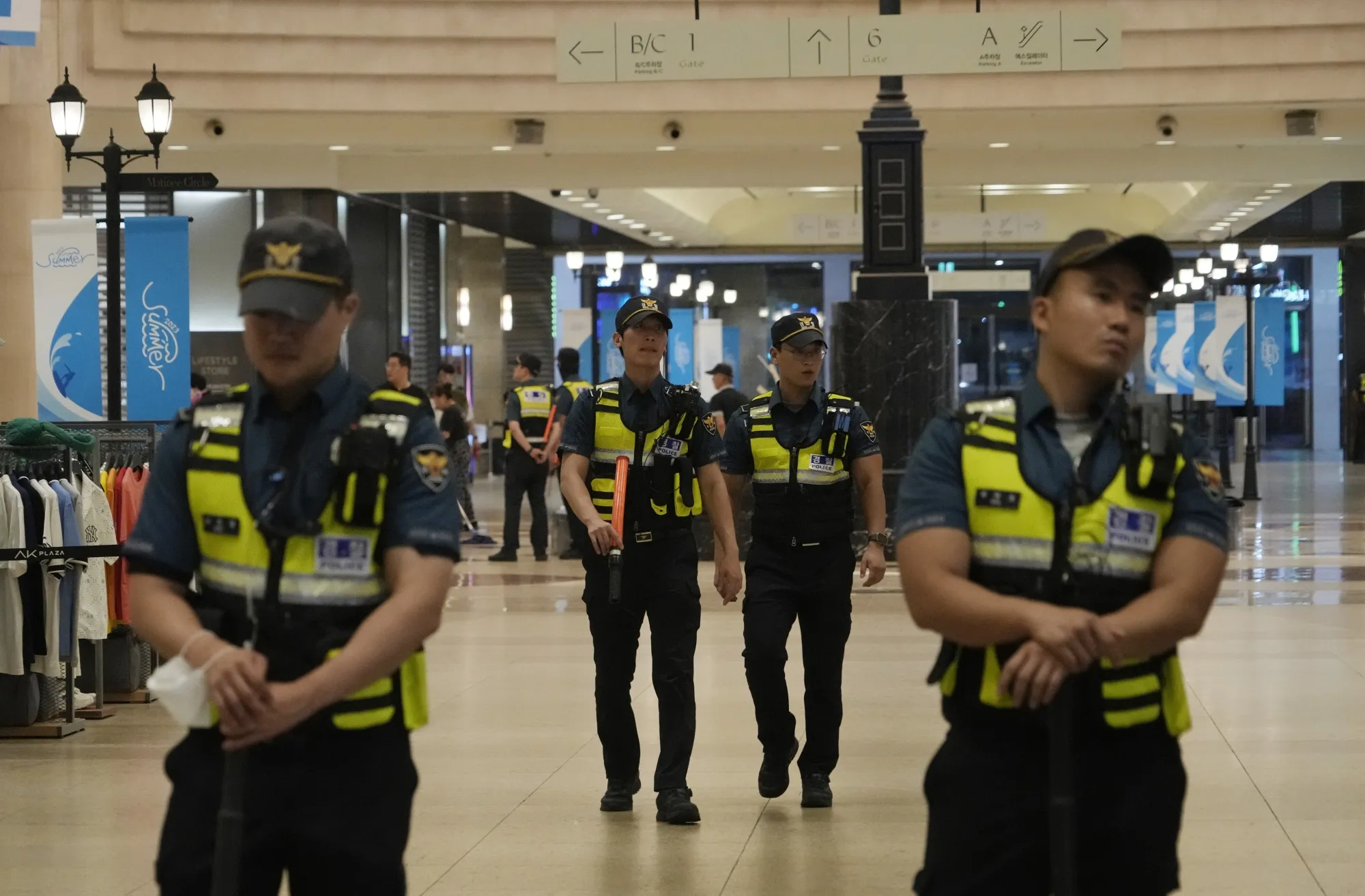 Police officers patrol near a subway station after a stabbing rampage in Seongnam on Aug. 3.