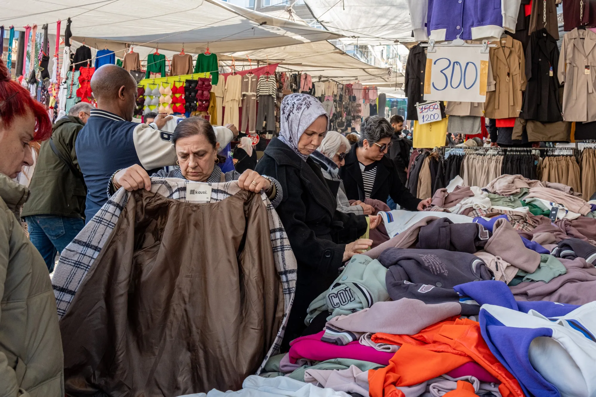 Shoppers browse garments for sale at the Findikzade market in Istanbul.