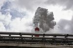Emissions rise from a smokestack at the PKN Orlen SA oil refinery in Plock, Poland.
