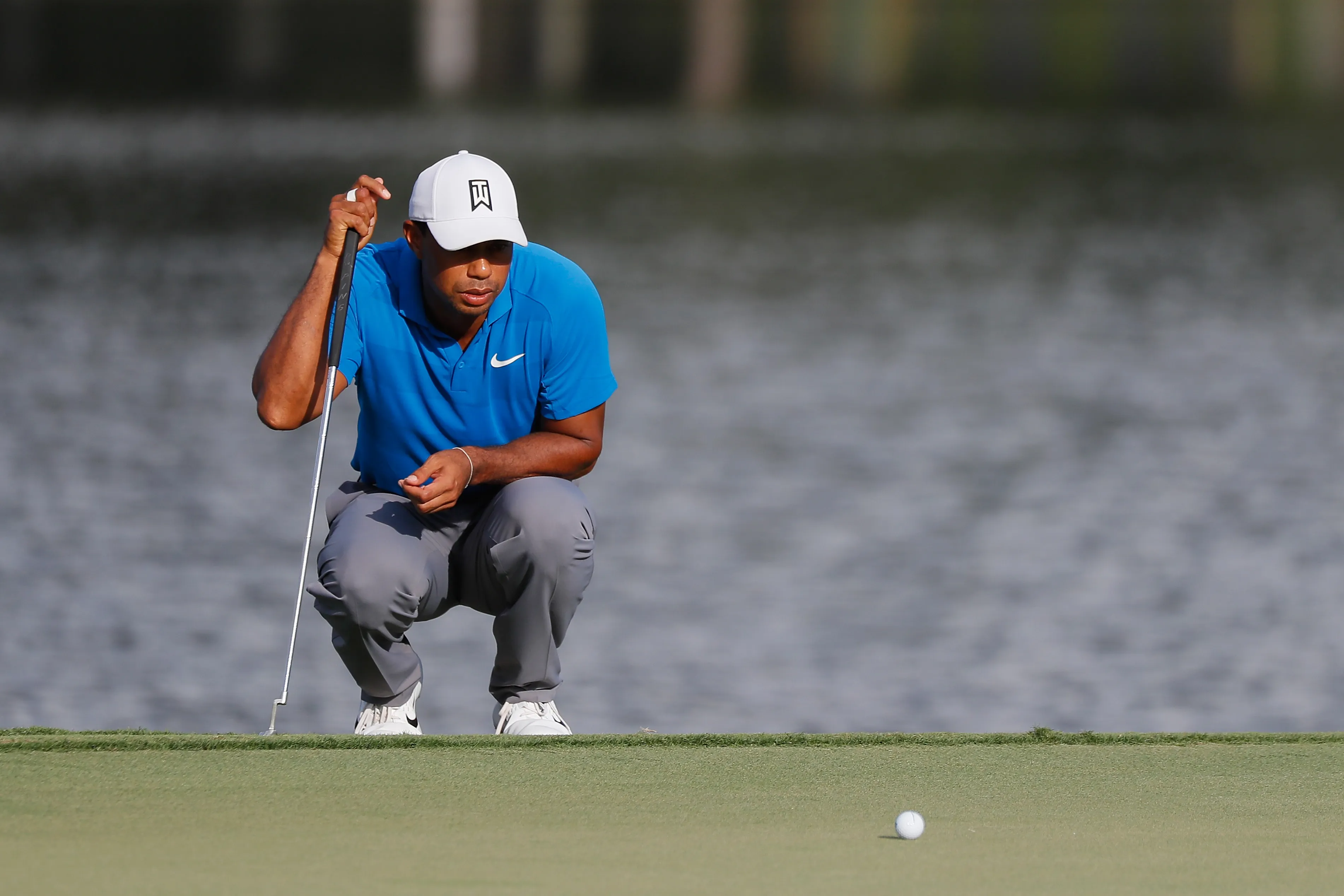 Tiger Woods lines up a putt on the 15th green during the third round of the TOUR Championship at East Lake Golf Club&nbsp;in Atlanta on Sept.&nbsp;22, 2018.