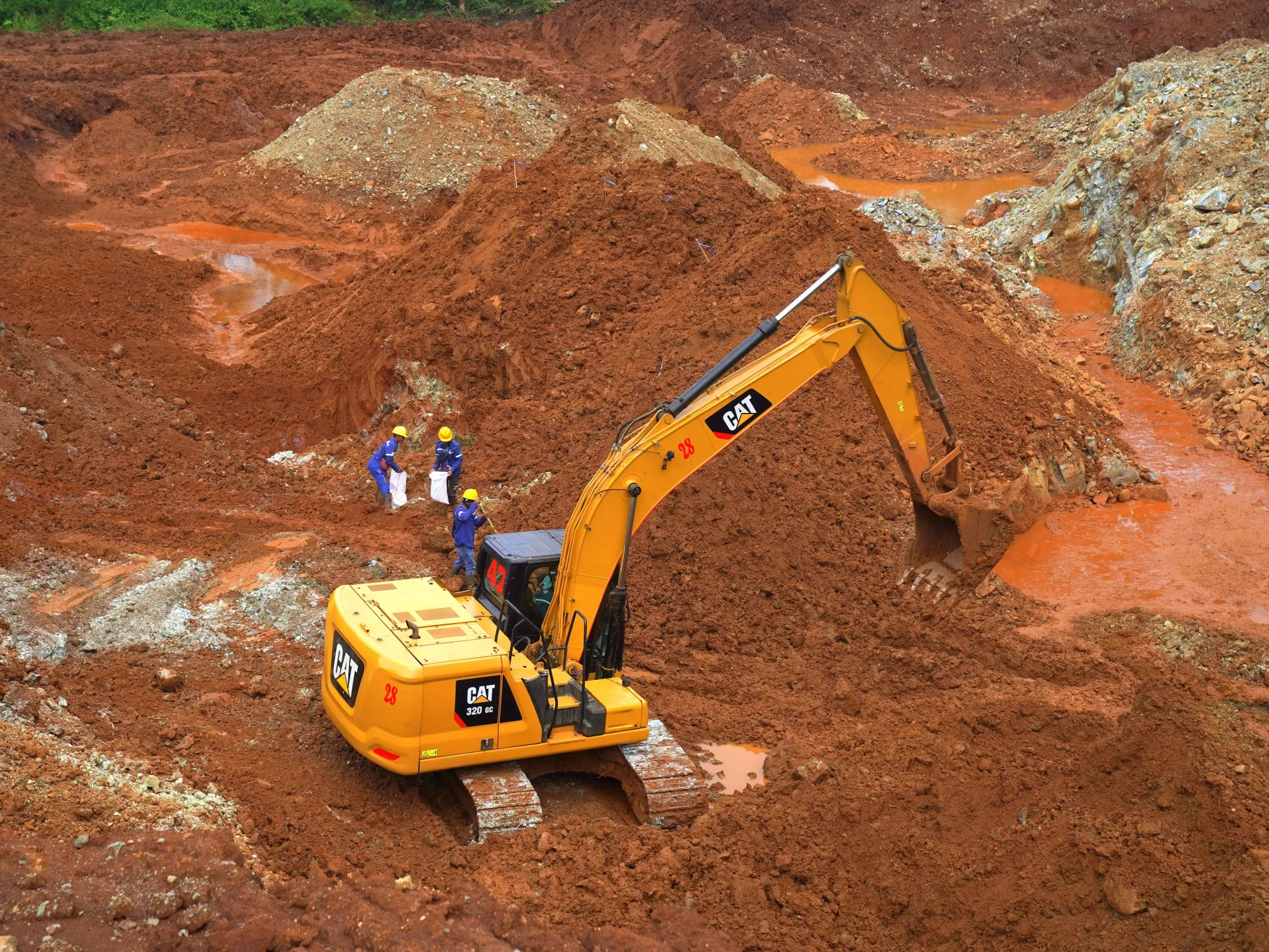 An excavator at a nickel mine operated by PT Teknik Alum Service in Indonesia.