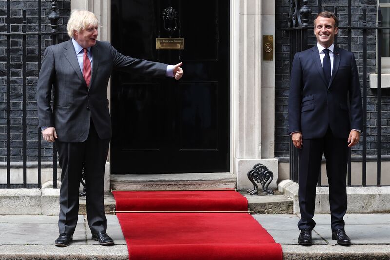 U.K. PM Johnson Hosts French President Macron