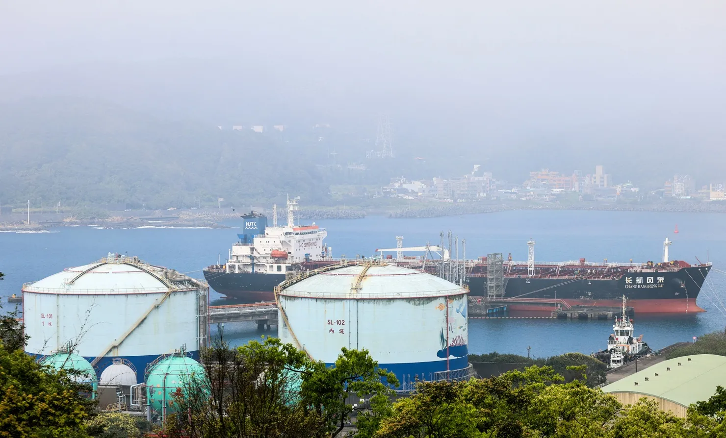 An oil products tanker docked beside a&nbsp;distribution service center area at Shen'ao Port in New Taipei City.