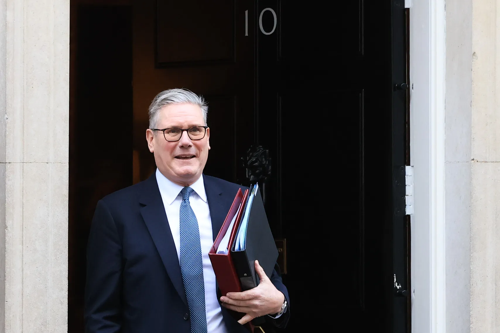 Keir Starmer leaves 10 Downing Street for Prime Ministers Questions yesterday