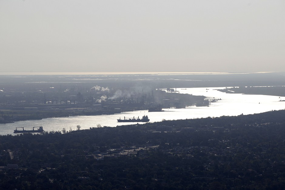 Aerial view of ships on the MIssissippi River and refineries in St. Bernard Parish, Louisiana.