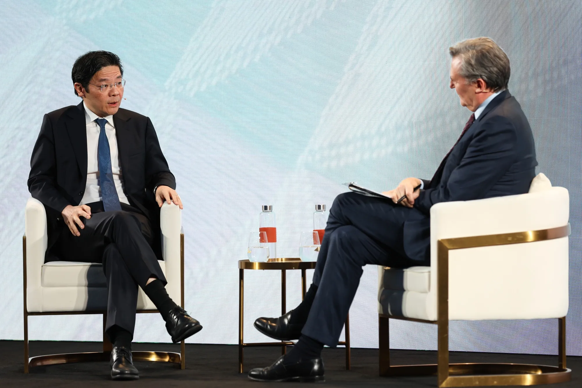 Lawrence Wong and John Micklethwait, editor-in-chief of Bloomberg News, on Wednesday, Nov. 19, 2025. 