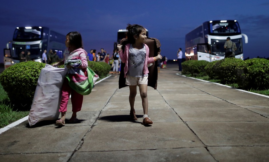 Venezuelan refugees arrive at Boa Vista Airport in Brazil.