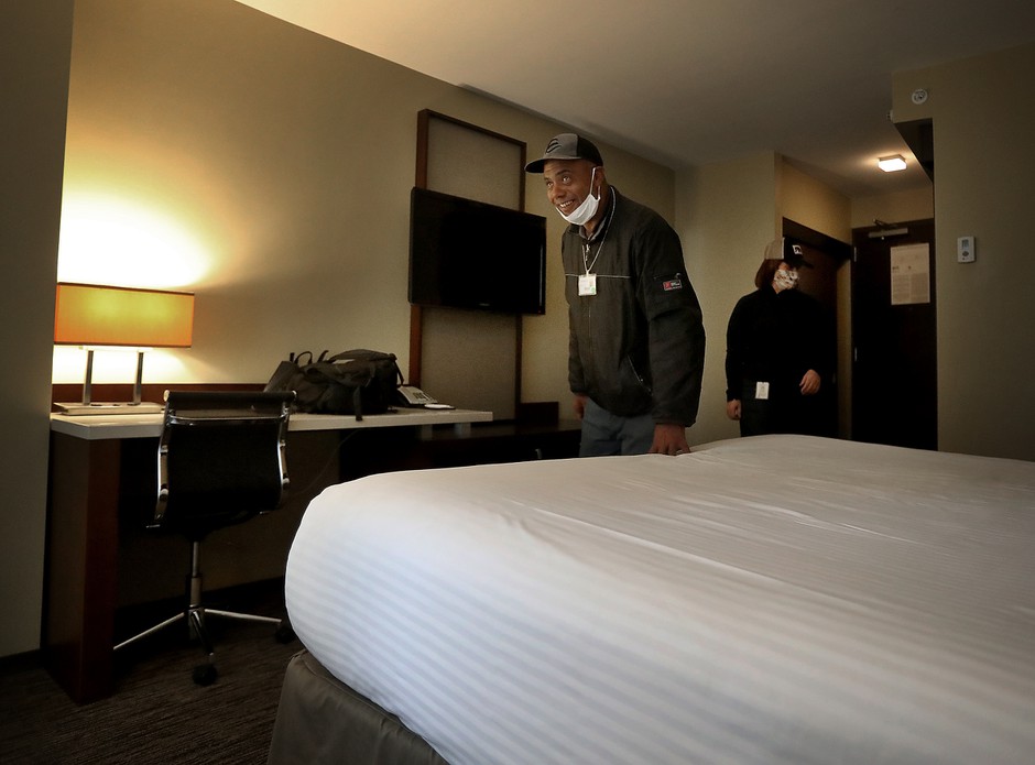 During the pandemic, many more people have been transferred from homeless shelters to hotels, like Douglas Pyle in Minneapolis.