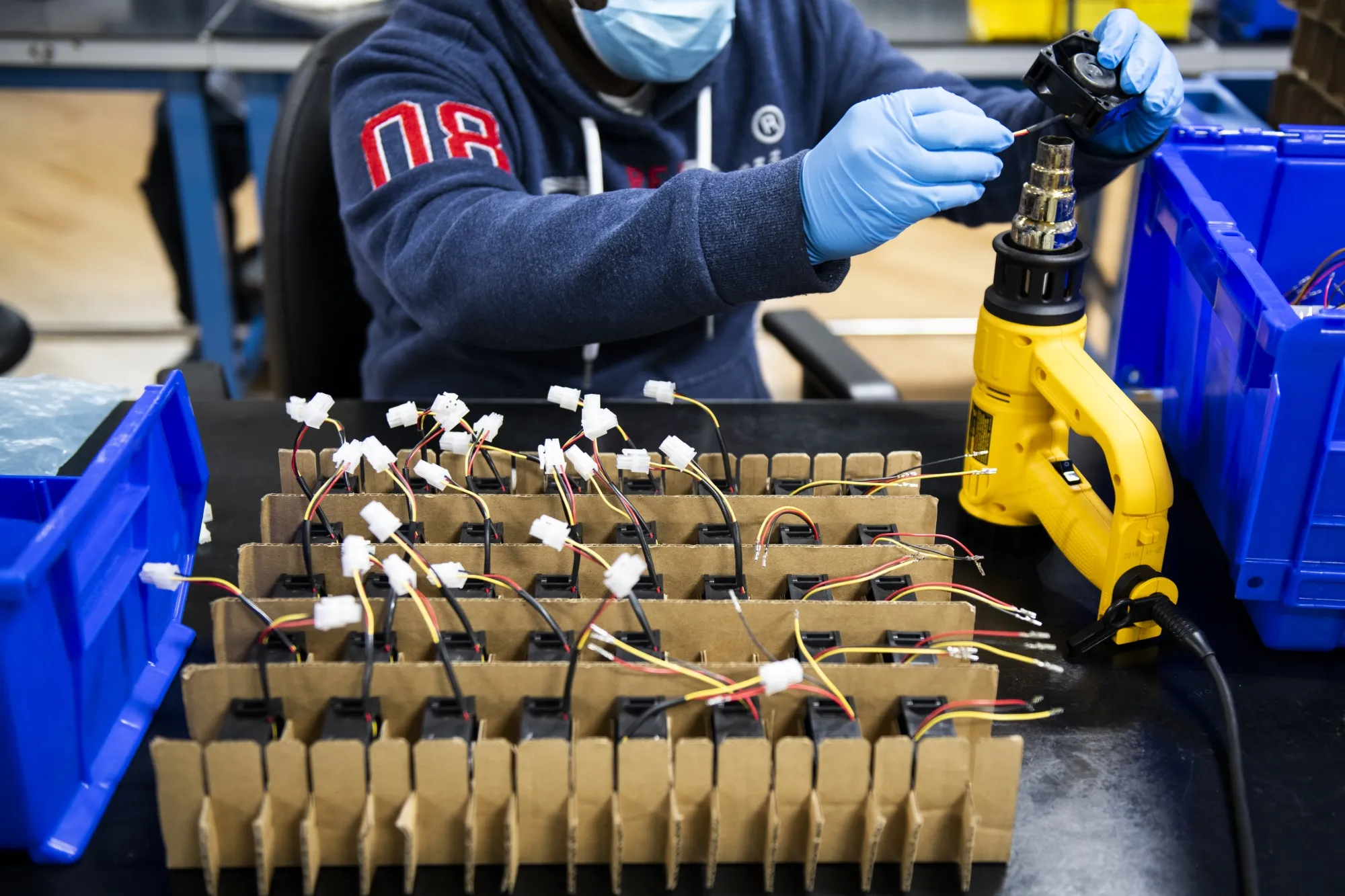 A worker works on wiring for bridge ventilators in Long Island City, New York.