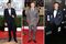 From left in Ford's designs: actor Bradley Cooper arrives at the 71st Annual Golden Globe Awards; actor/singer Justin Timberlake arrives at the 19th Annual Screen Actors Guild Awards; actor Eddie Redmayne attends the amfAR LA Inspiration Gala honoring Tom Ford on Oct. 29, 2014.