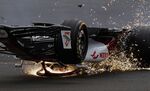 Alfa Romeo's Zhou Guanyu slides towards the barrier after a collision at the start of the race during the British Grand Prix 2022 at Silverstone on July 3.