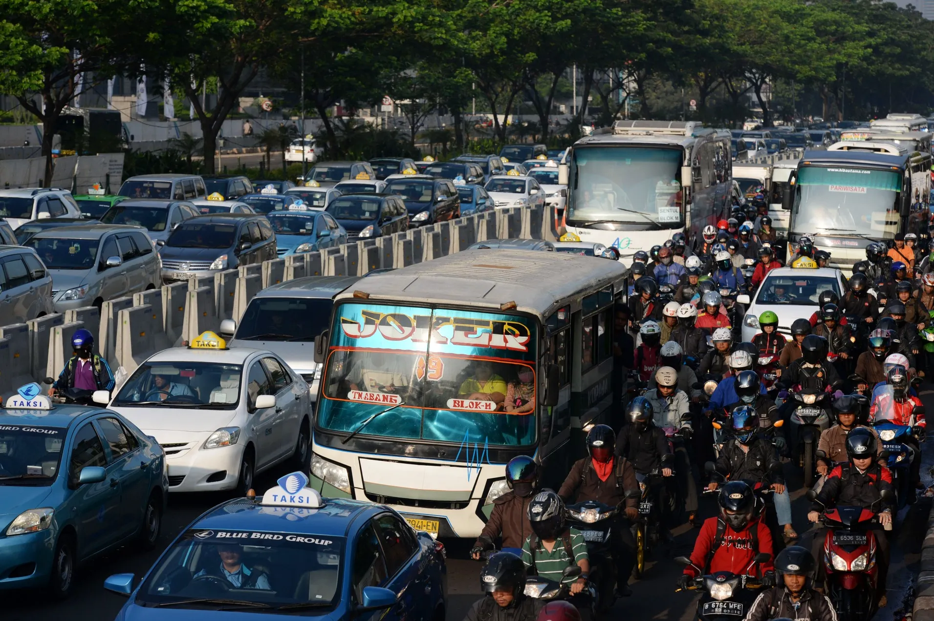 Jakarta's Financial District And Commuters As Indonesia Parliament Approves Revised Budget