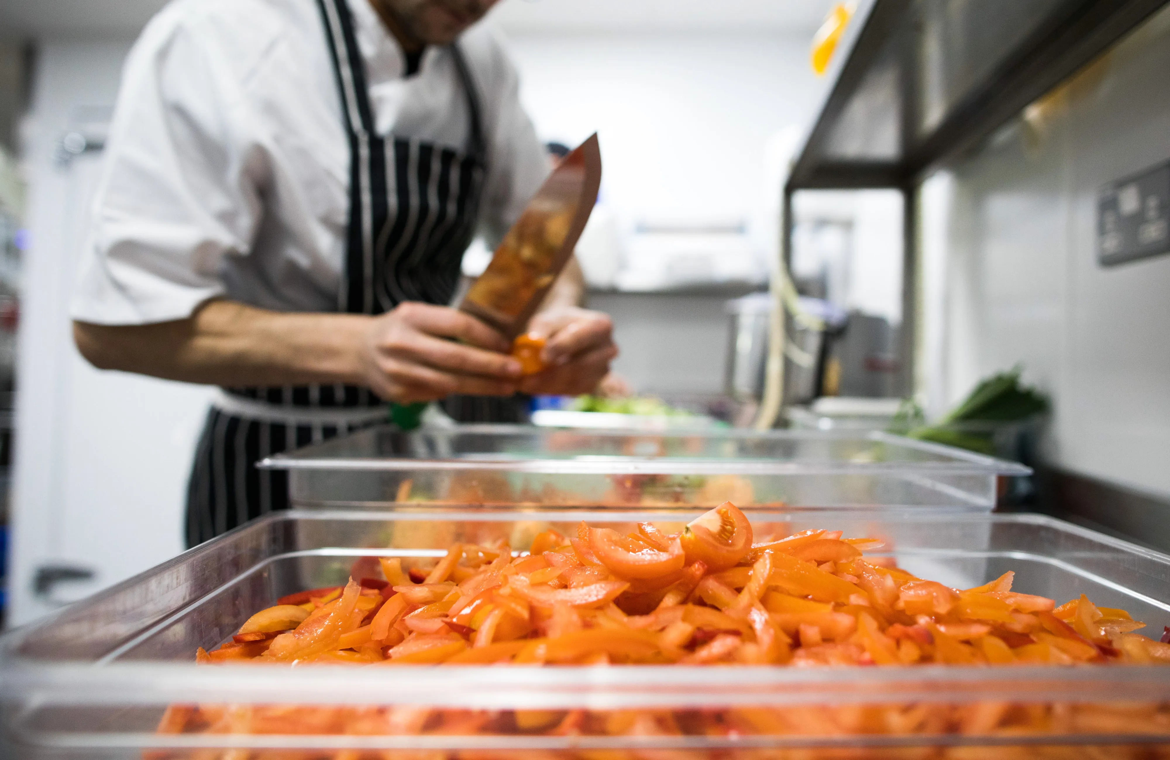 A chef works in a restaurant kitchen in London.