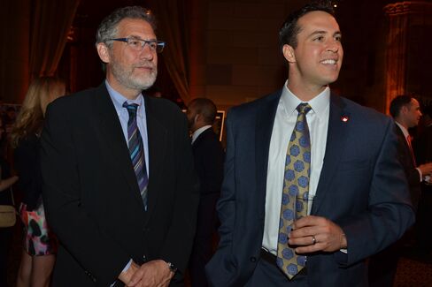 Jonathan Rose, president of Jonathan Rose Companies, and Mark Teixeira, of the Yankees, who is also a Harlem RBI board member. Photographer: Amanda Gordon/Bloomberg