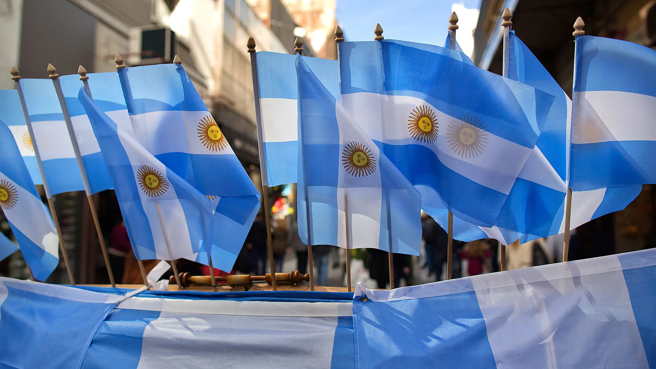 Argentine flags are displayed for sale along one of the main commercial thoroughfares, in Buenos Aires.

