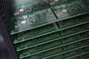 Printed circuit boards for Raspberry Pi single-board computers sit stacked ahead of assembly on the production line at Sony Corp.'s technology centre in Pencoed, U.K.