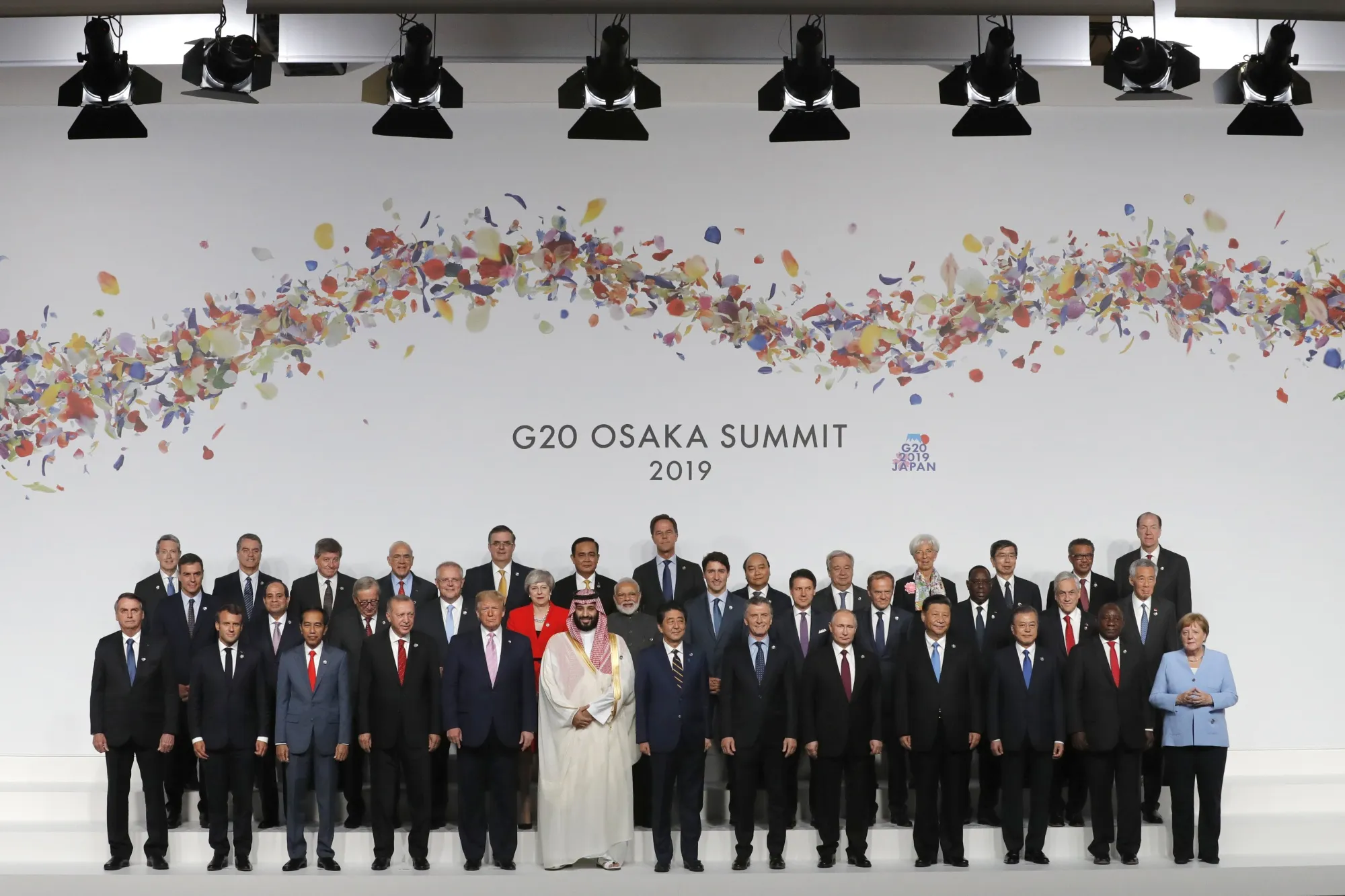 Angela Merkel poses with fellow leaders for a family photograph at the G-20 summit in Osaka, on June 28.