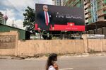 A&nbsp;billboard that announces the return of ousted former president Gotabaya Rajapaksa who ended his self-imposed exile in Thailand and came back to the island, in Colombo on Sept. 4.