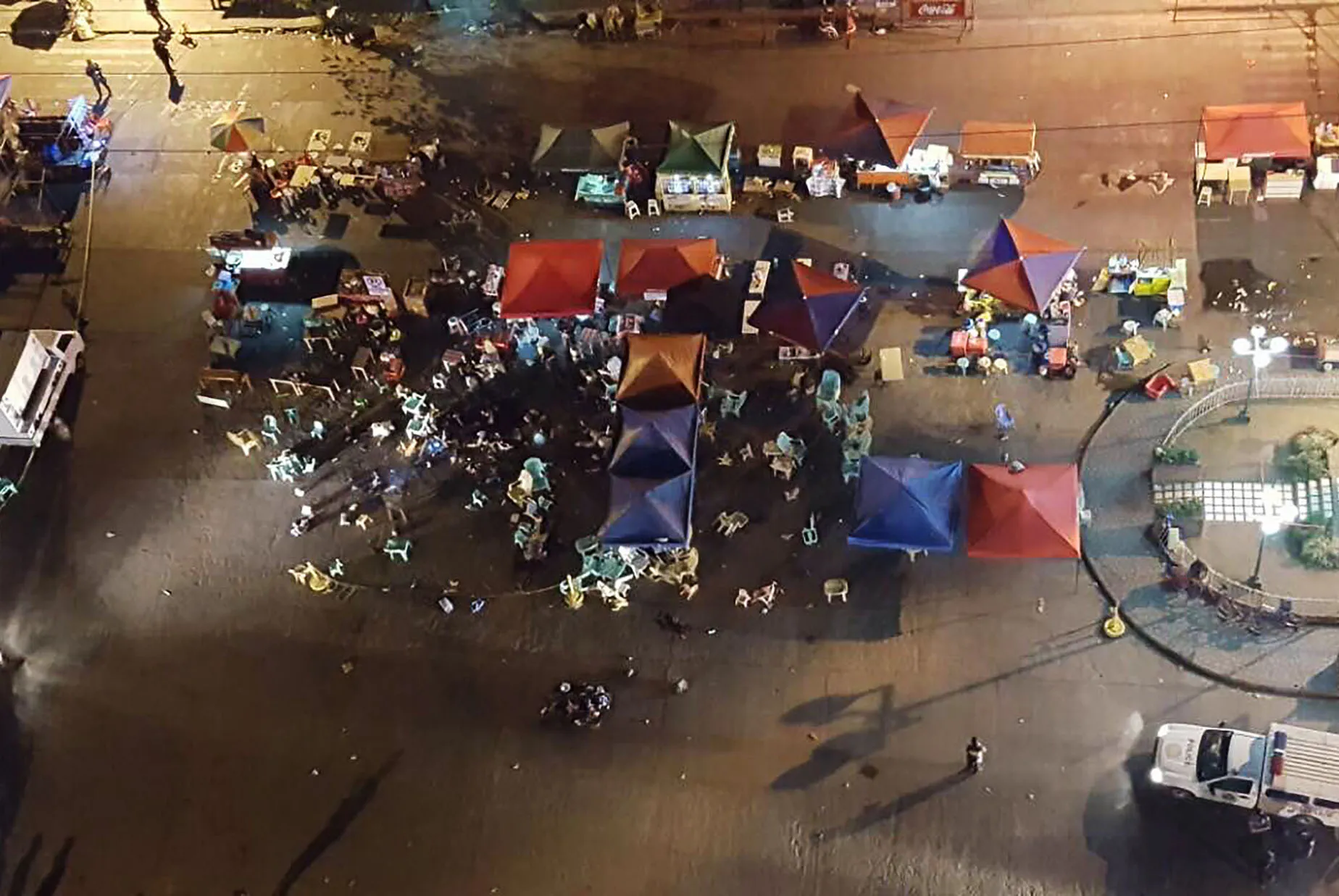 A photo taken from a mobile phone shows a general view of the site of an explosion at a night market in Davao City, in southern island of Mindanao, on September 2, 2016.
