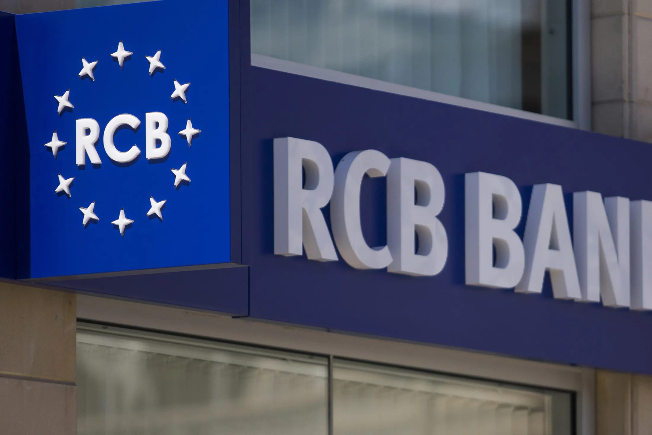 A logo sits on display outside an RCB branch in Limassol, Cyprus.
