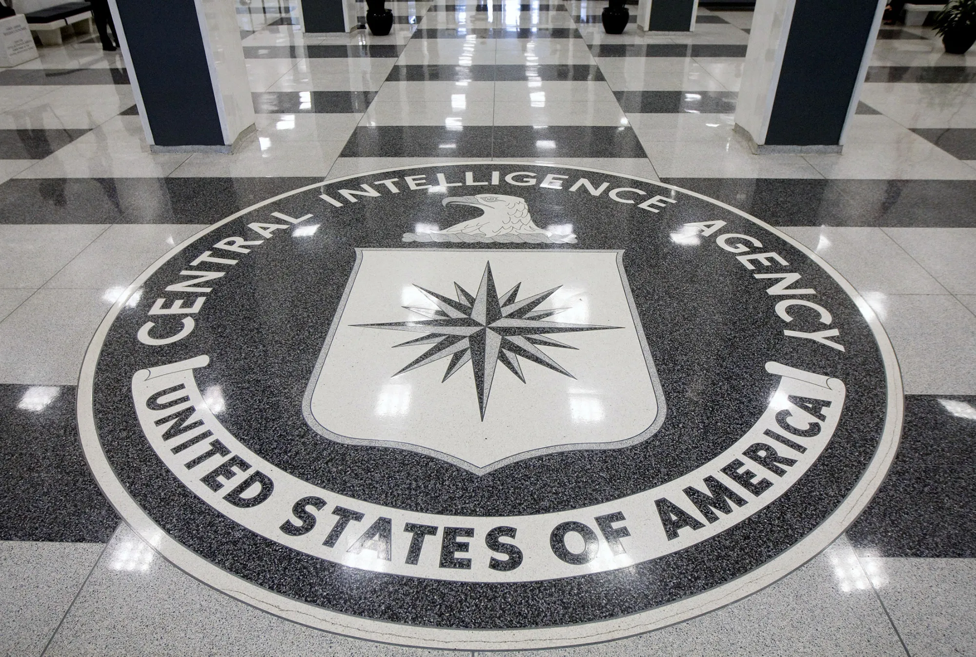 The seal of the Central Intelligence Agency is displayed in the foyer of the original headquarters building in Langley, Virginia, U.S., on Friday, Sept. 18, 2009. CIA Director Leon Panetta said this week he never contemplated resigning over a newly begun Justice Department inquiry into tactics used during interrogations of terrorist suspects.
