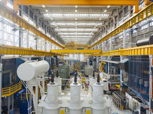 A large power transformer  in the high voltage testing area at the GE Vernova factory.