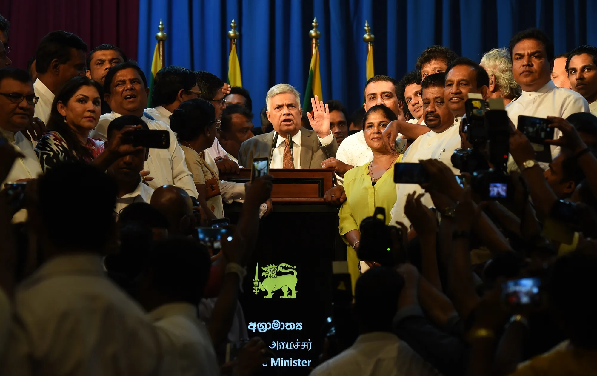 Ranil Wickremesinghe speaks to supporters at the prime minister’s official residence in Colombo on Dec. 16.