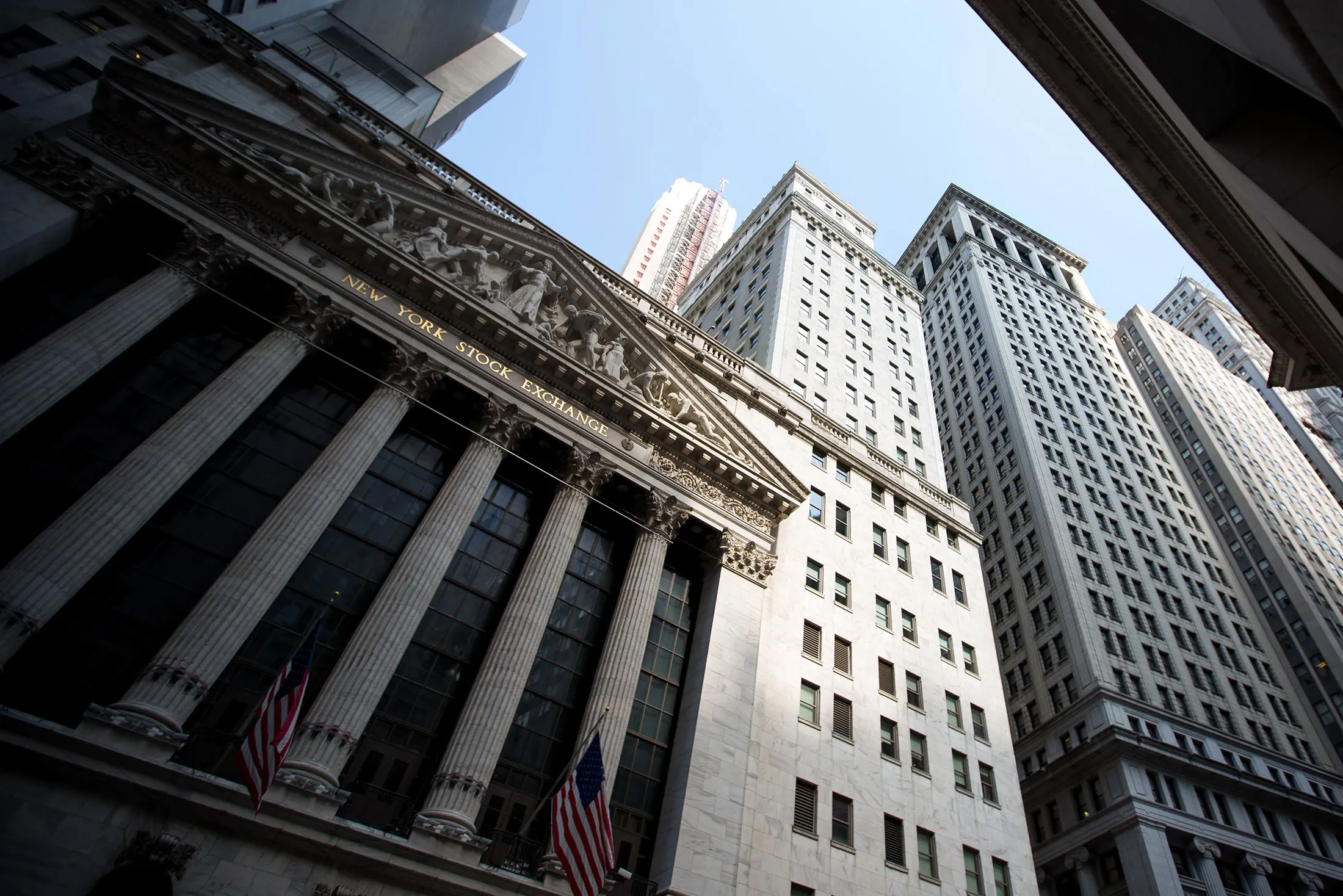 American flags fly outside The New York Stock Exchange.

