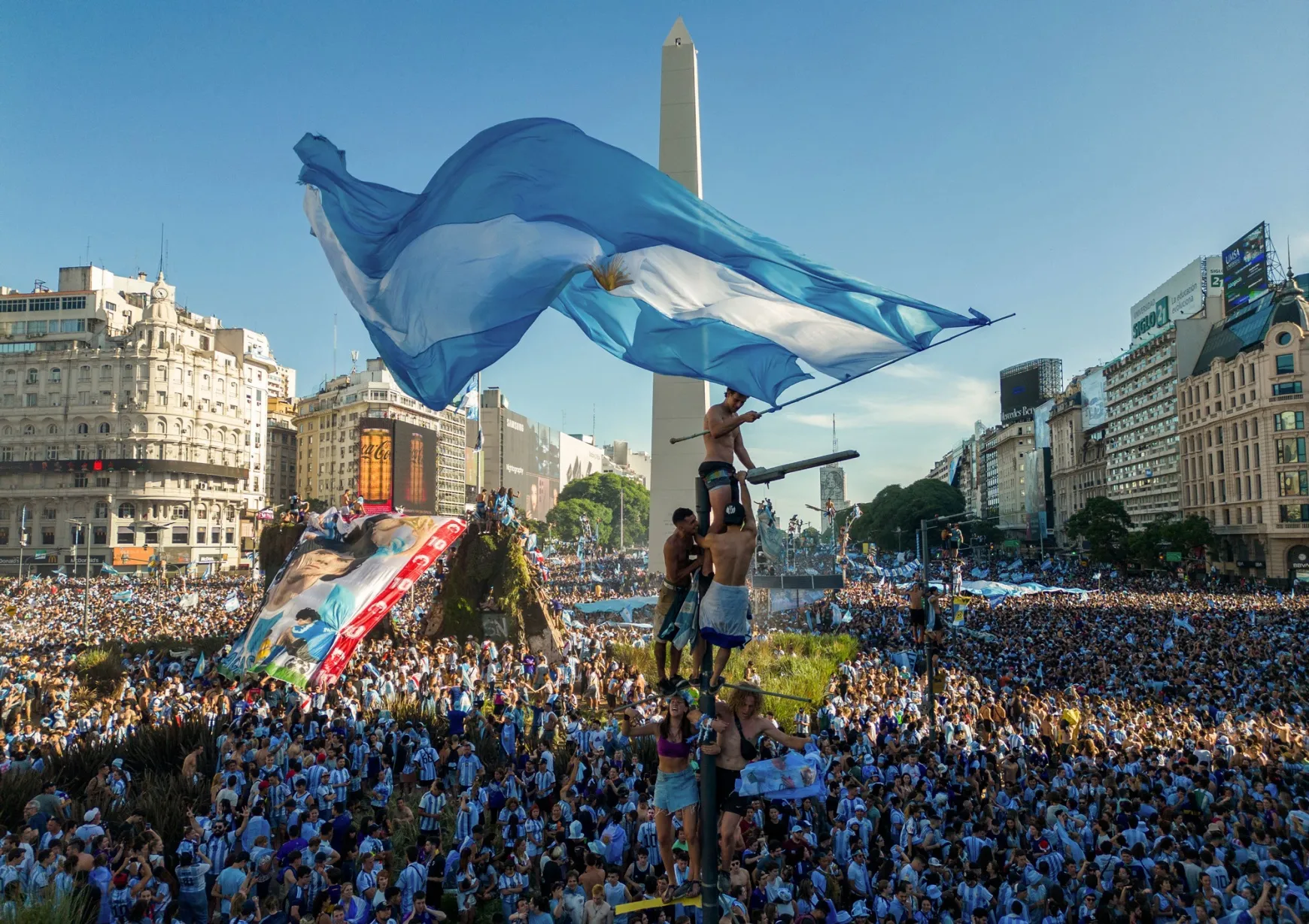 Argentinians celebrate winning the Qatar 2022 World Cup in Buenos Aires, on Dec. 18, 2022.